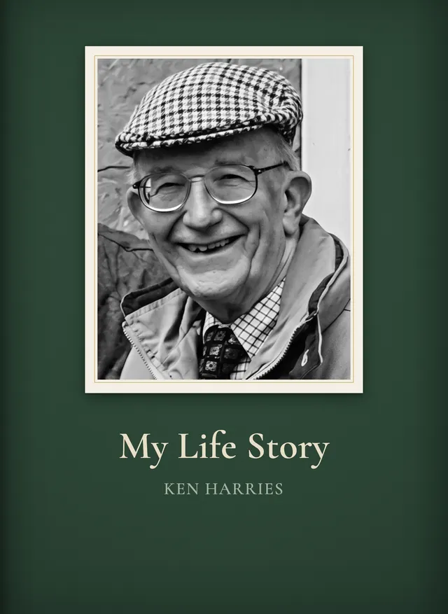 Example Chronicle cover – "My Life Story" by Ken Harries, a forest-green hardback carrying a black-and-white photograph of a smiling older man in a checked flat cap and glasses, the title in cream serif beneath