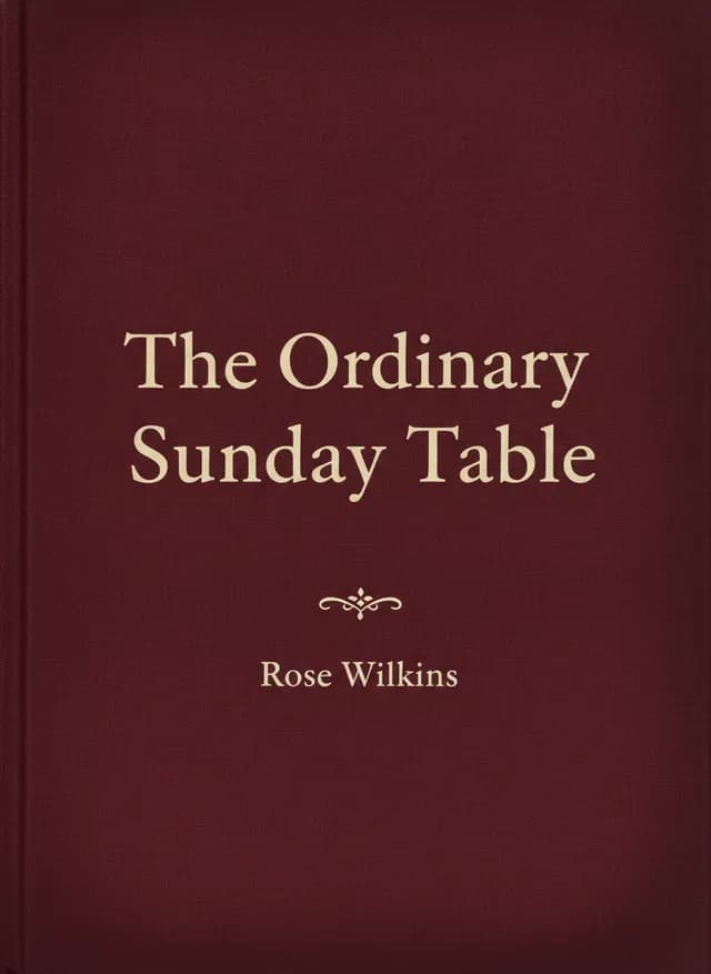 Example Chronicle cover – "The Ordinary Sunday Table" by Rose Wilkins, a rich oxblood-burgundy cloth cover with a centred cream serif title and a small ornament